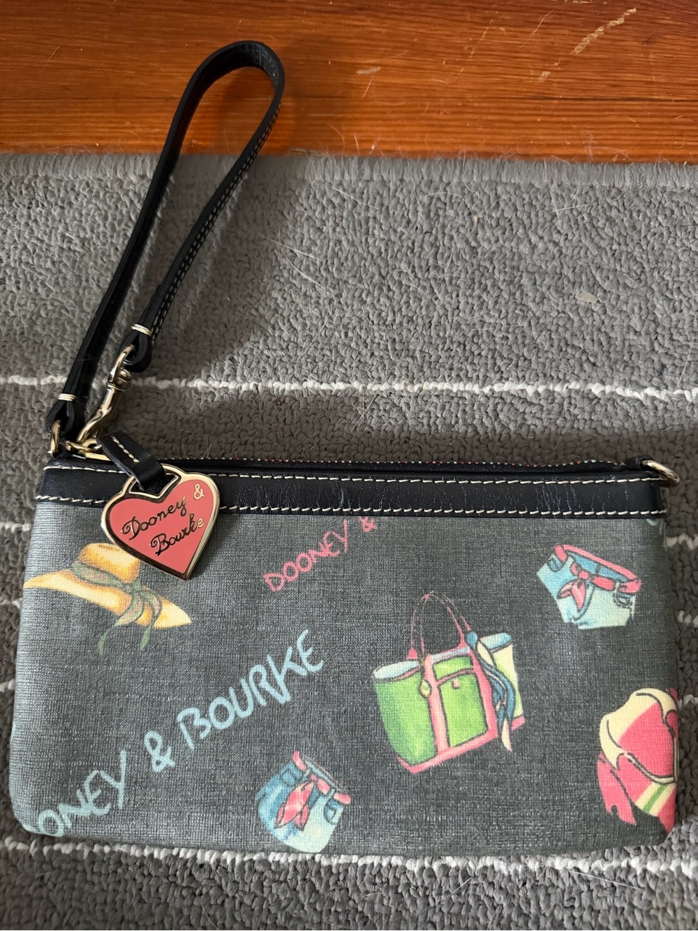 Dooney & Bourke Black Wristlet with Pastel Multicolor Purse Print